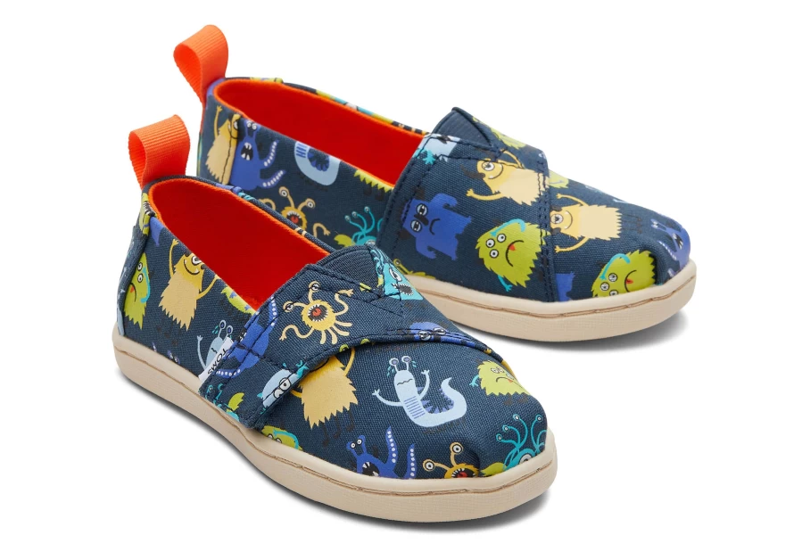 TOMS Kids Alpargata Indigo Glow Slip-On Toddler Shoes - Blue Monsters Design