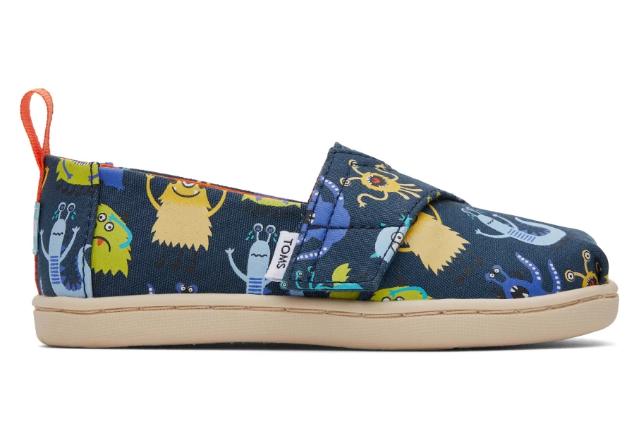 TOMS Kids Alpargata Indigo Glow Slip-On Toddler Shoes - Blue Monsters Design